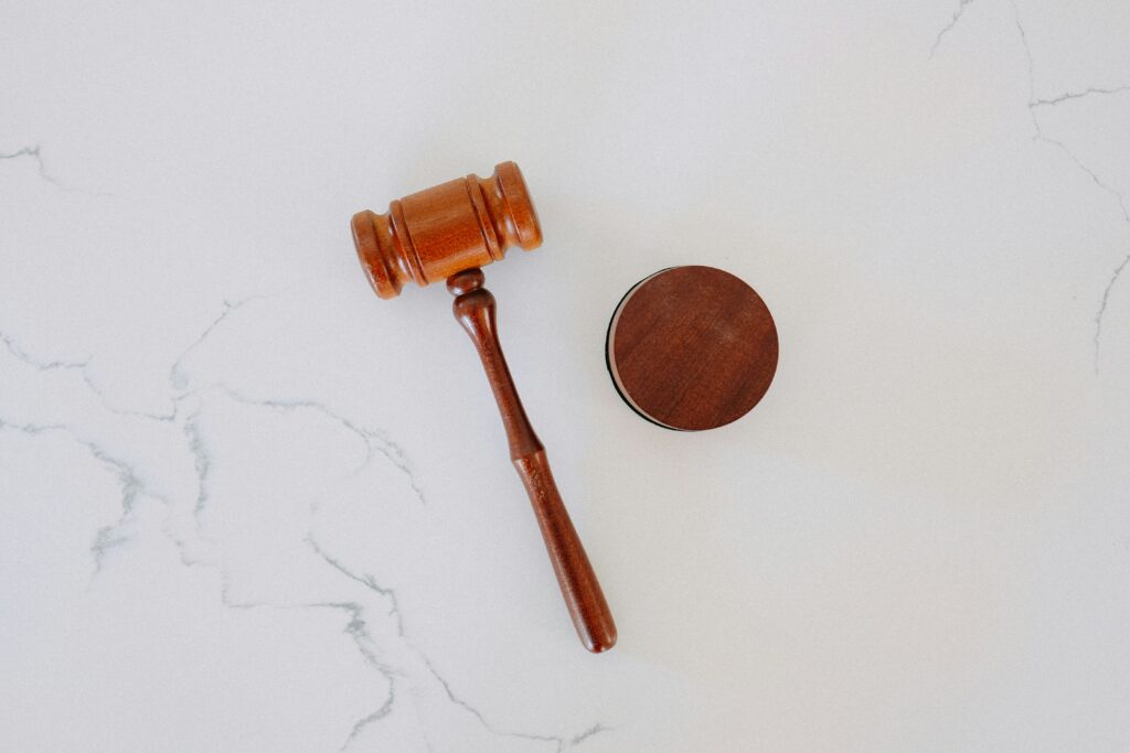 a wooden spoon on a white surface